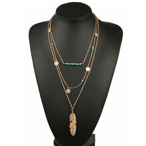 Layered gold and turquoise boho chic feather charm fashion necklace